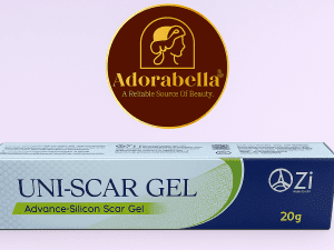 Uni-Scar Gel 20gm tube and box on white table with Adorabella logo and green natural background