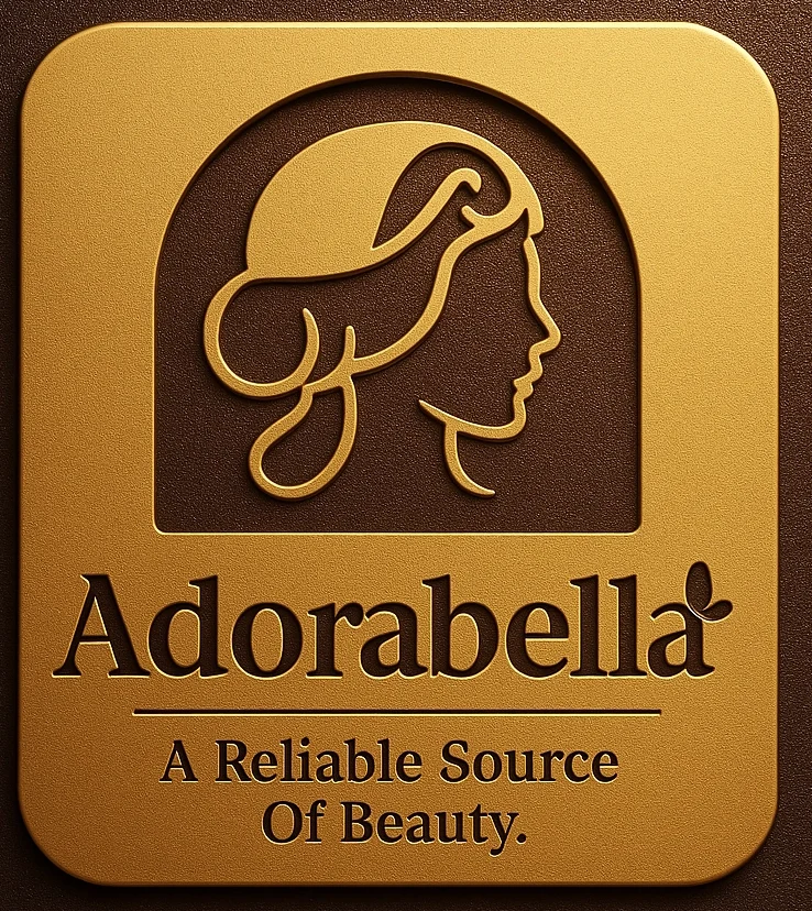 Adorabella logo – gold embossed profile of a woman with the tagline “A Reliable Source of Beauty.
